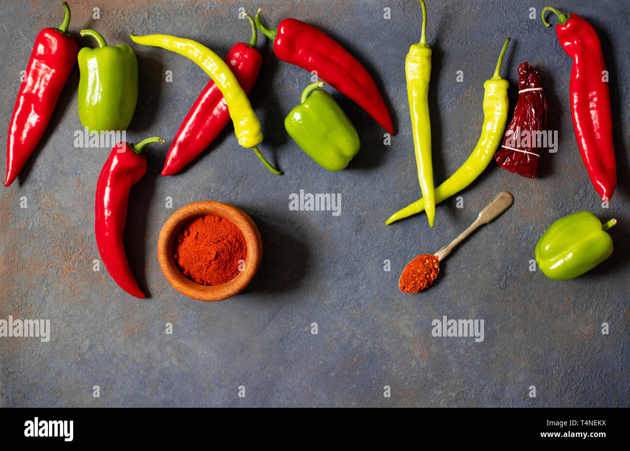 Peppers. Different kinds of pepper. Red peppers, green peppers, hot  peppers, dried paprika, paprika powder, jalapeno, chili, spices. Top view  Stock Photo - Alamy