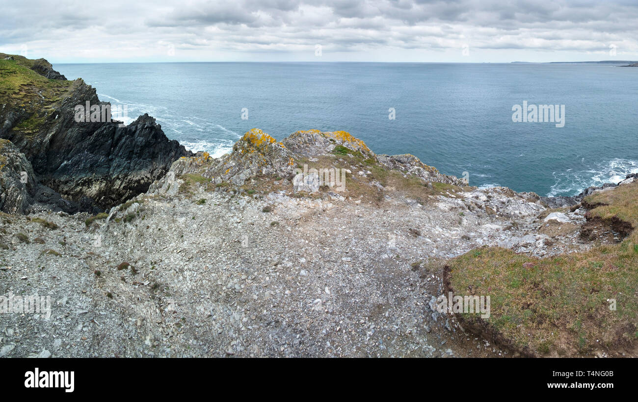 A panoramic image of the rocky rugged coastline on Pentire Point East in Newquay in Cornwall. Stock Photo