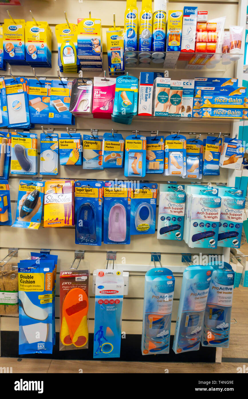 A display in a pharmacy showing all remedies for foot complaints Stock