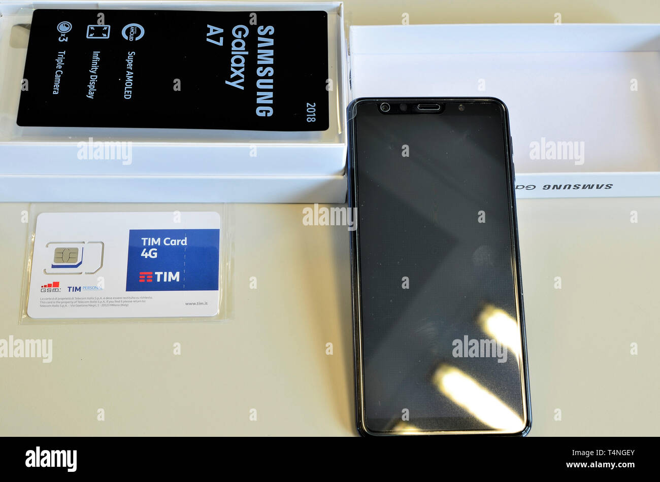 Turin, Piedmont, Italy. April 2019. The package of a Samsung Galaxy A7 has been opened, it recognizes the SIM of the telephone operator and the smartp Stock Photo