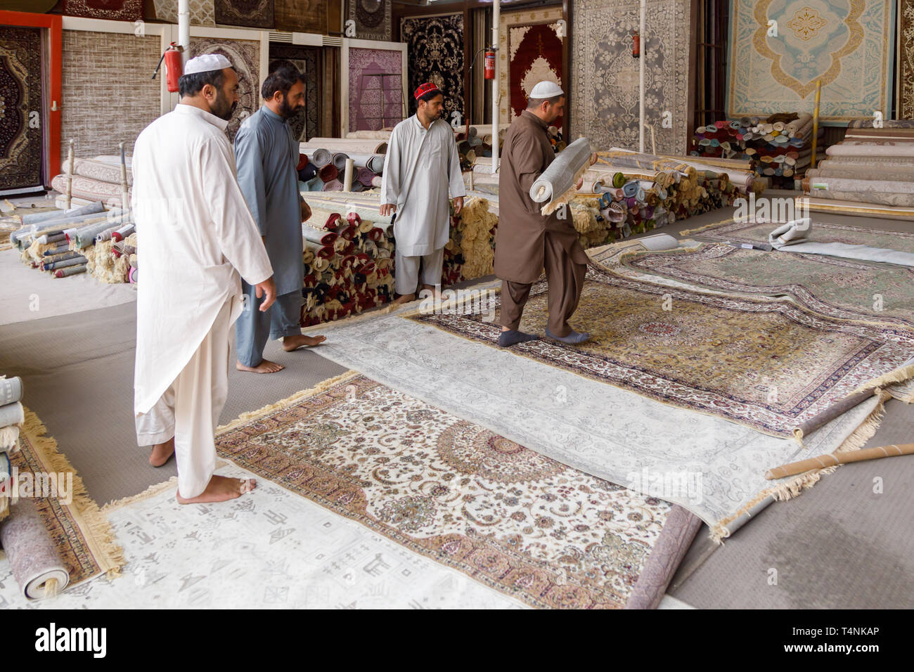 FUJAIRAH, UAE, JANUARY 11, 2019 Sellers show exquisite carpets in the