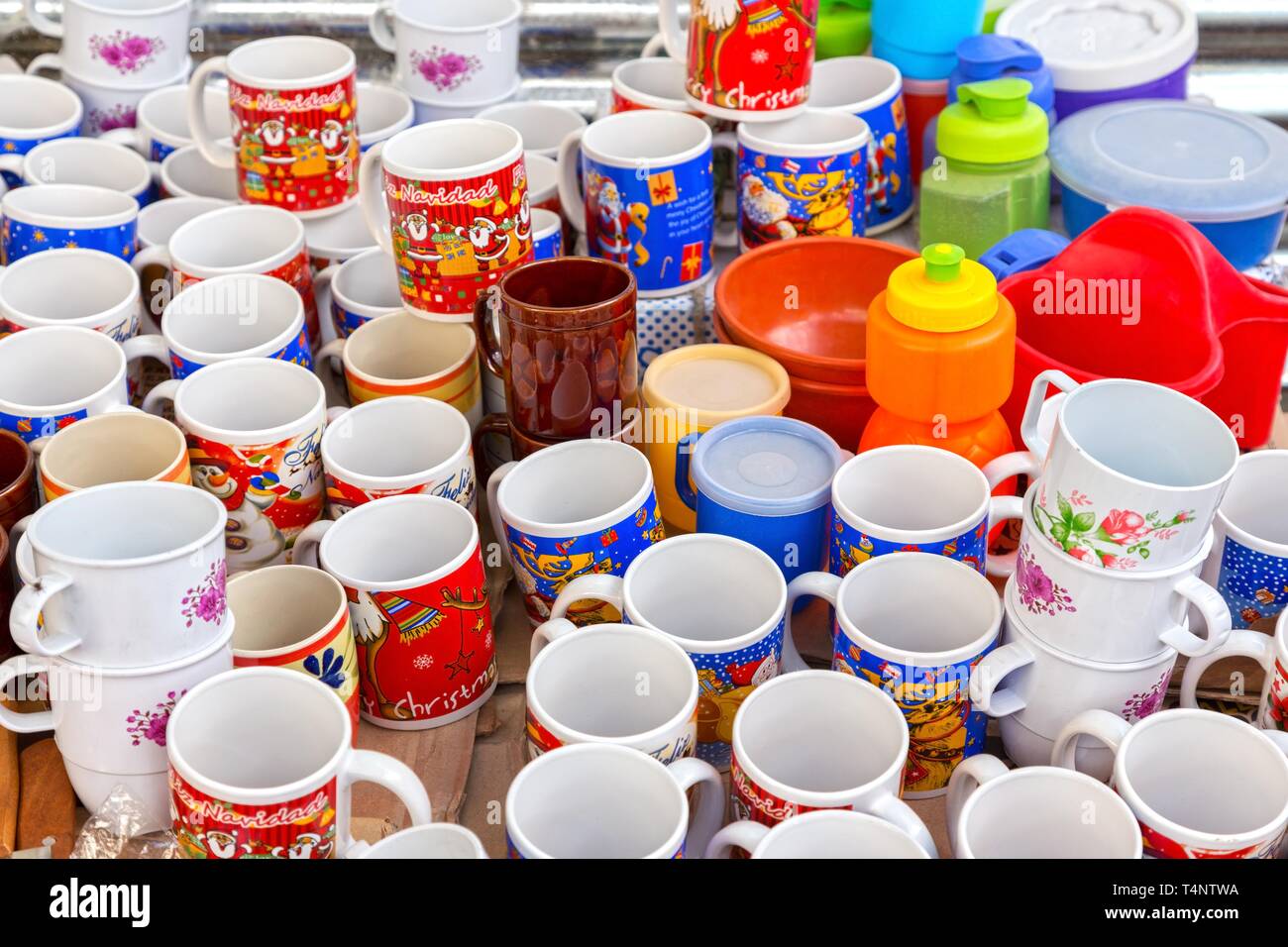 Assorted Artisan Tea and Coffee Cups with Christmas Motif  Picture taken on a market day in Chichicastenango, Guatemala Stock Photo