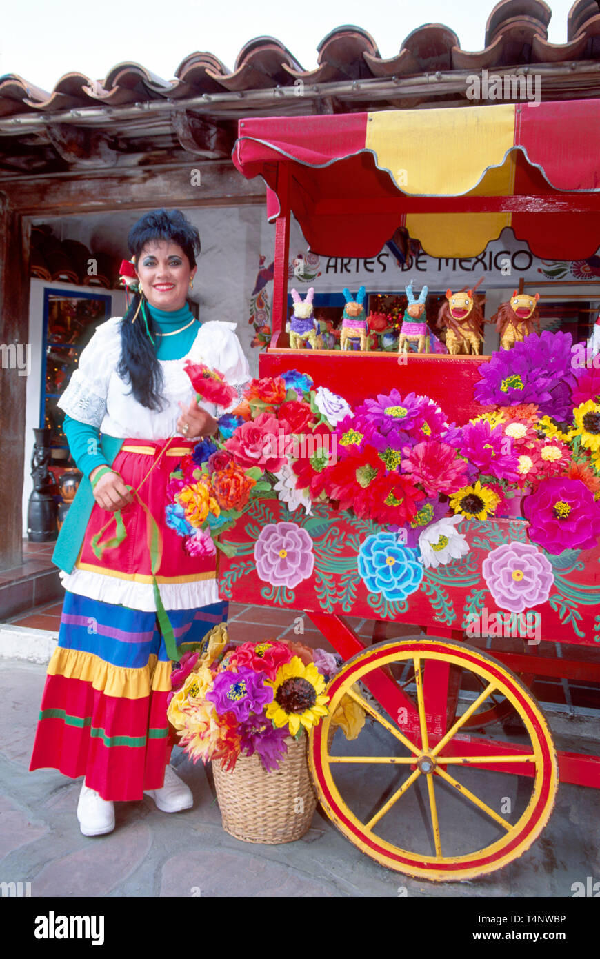 California San Diego Old Town Bazaar del Mundo Mexican woman,female,women,paper flower kiosk CA182,CA182 Stock Photo