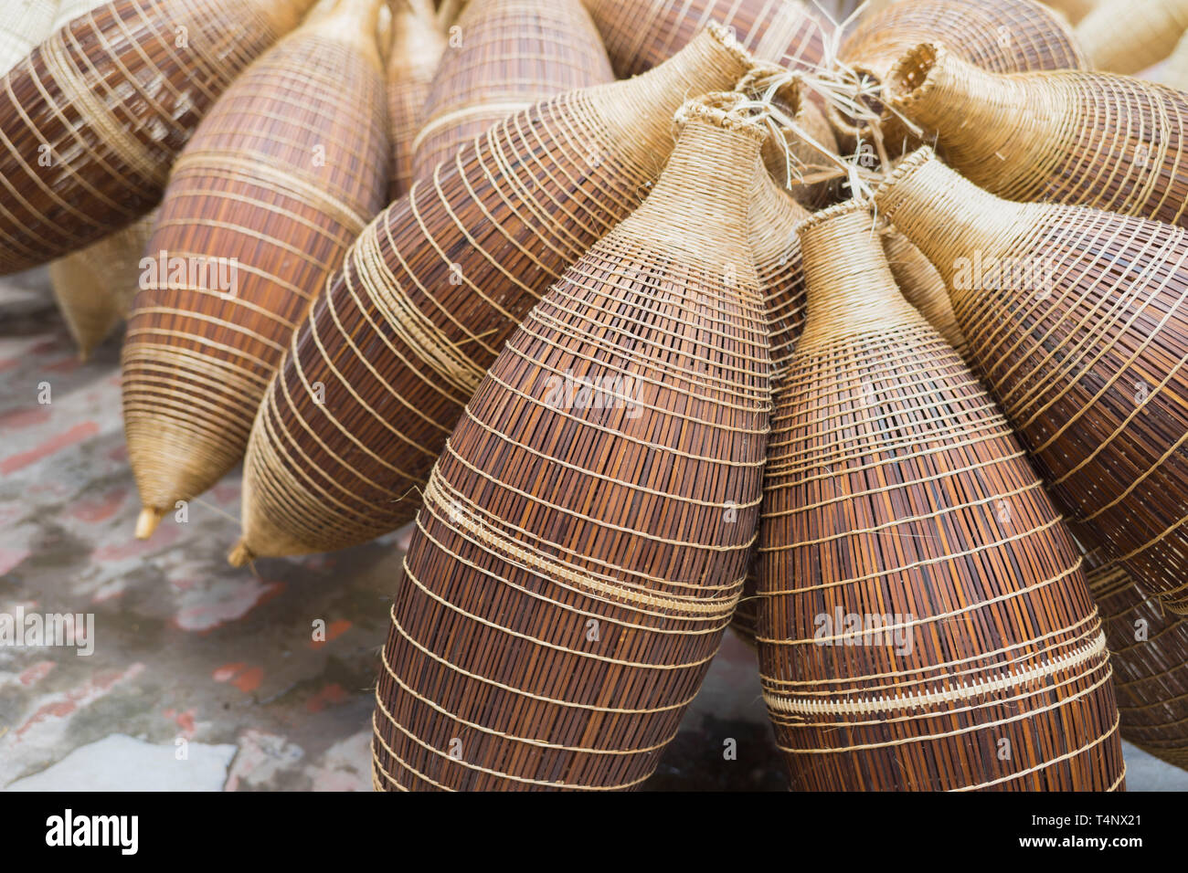 Vietnam old traditional fish trap made of bamboo Stock Photo - Alamy