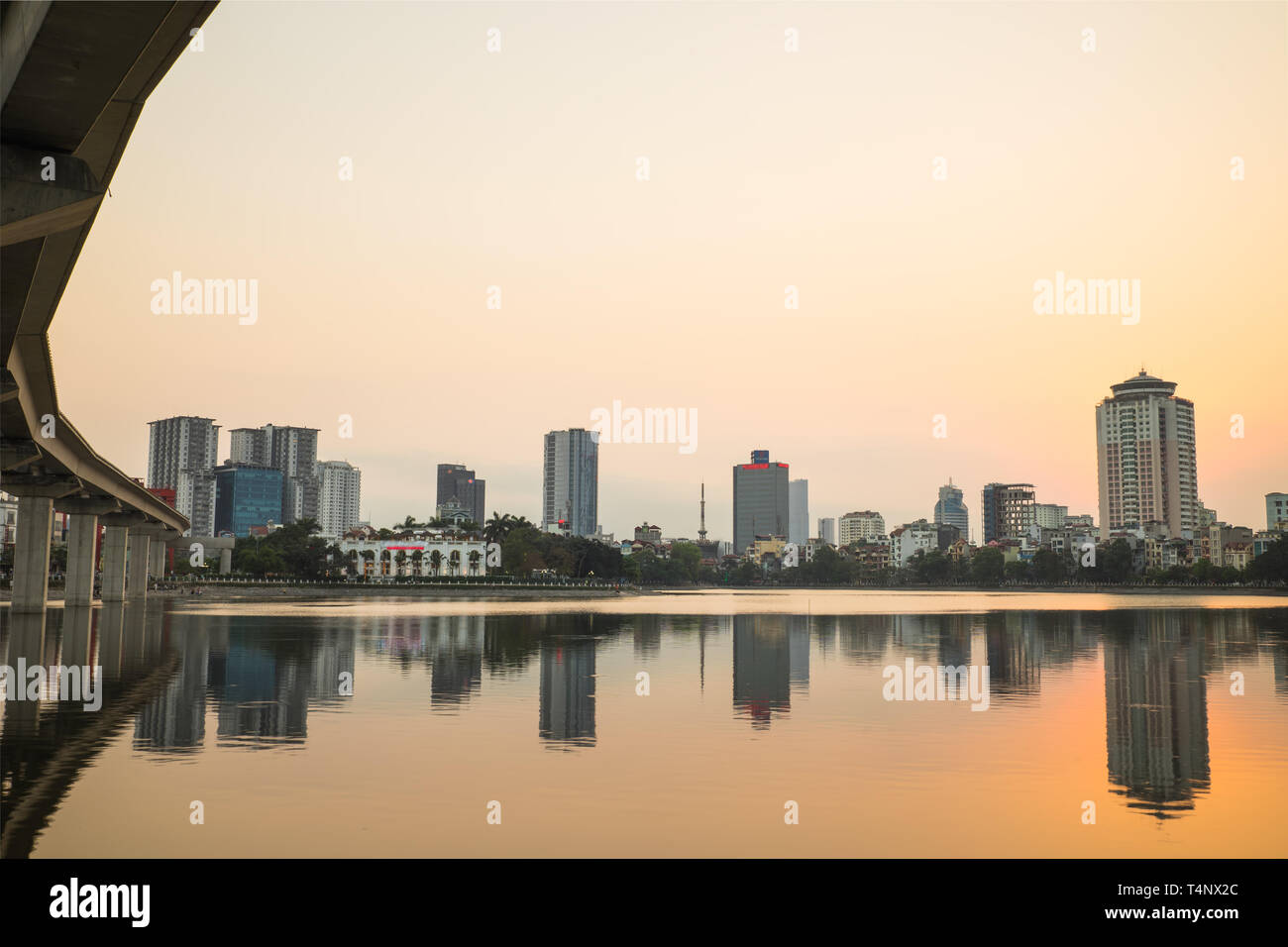 Panorama view of Hanoi cityscape at sunset period. Dong Da lake Stock Photo