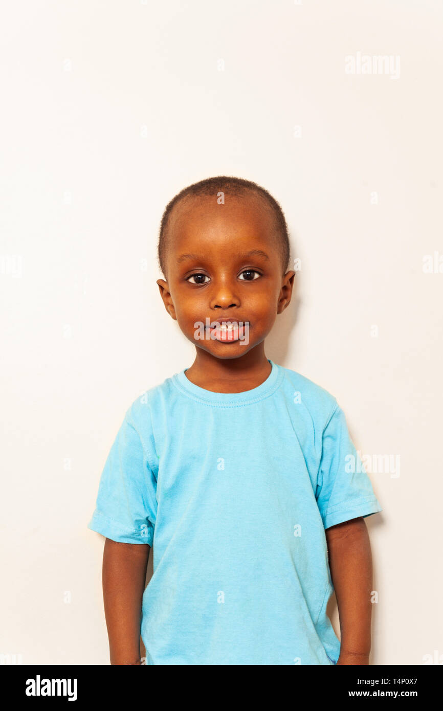 Close simple portrait of little black boy smiling Stock Photo - Alamy