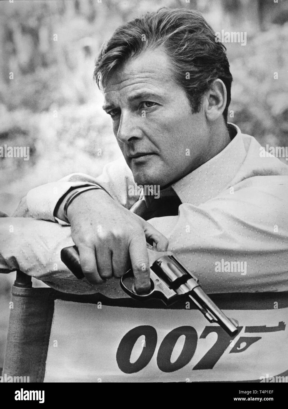 Roger Moore As James Bond 007 Live And Let Die 1973 On Set Candid During Location Filming Director Guy Hamilton Producers Harry Saltzman And Albert R Broccoli Eon Productions United Artists