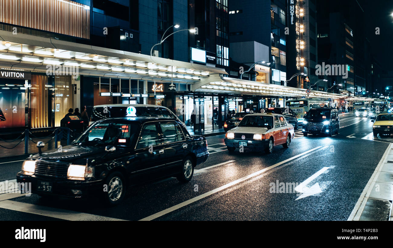 Rainy Night time in the streets of Kyoto, Japan Stock Photo