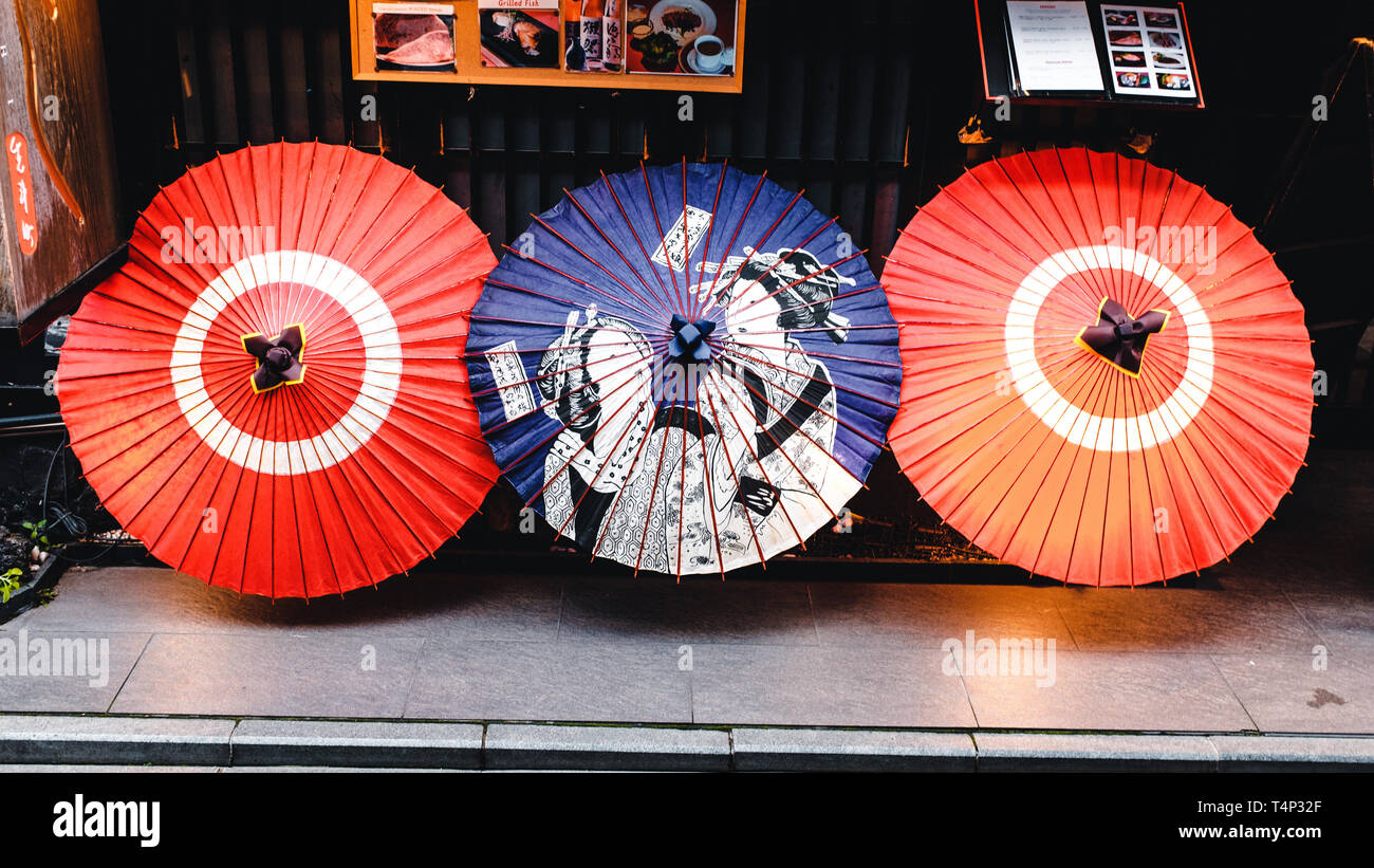 Three Umbrellas in the Streets of Kyoto, Japan Stock Photo - Alamy