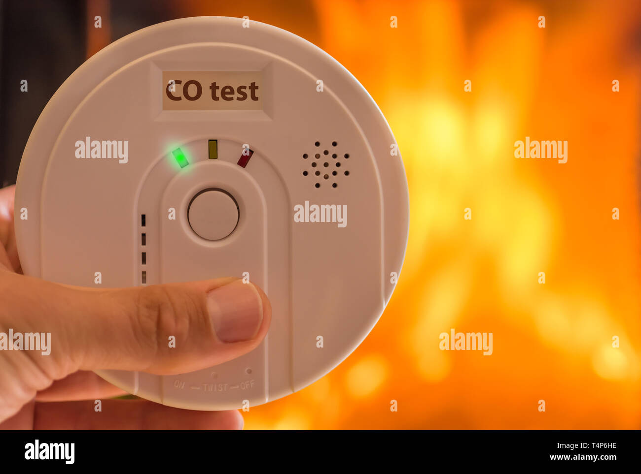 Carbon monoxide alarm in the air for rooms heated by stoves and fireplaces Stock Photo