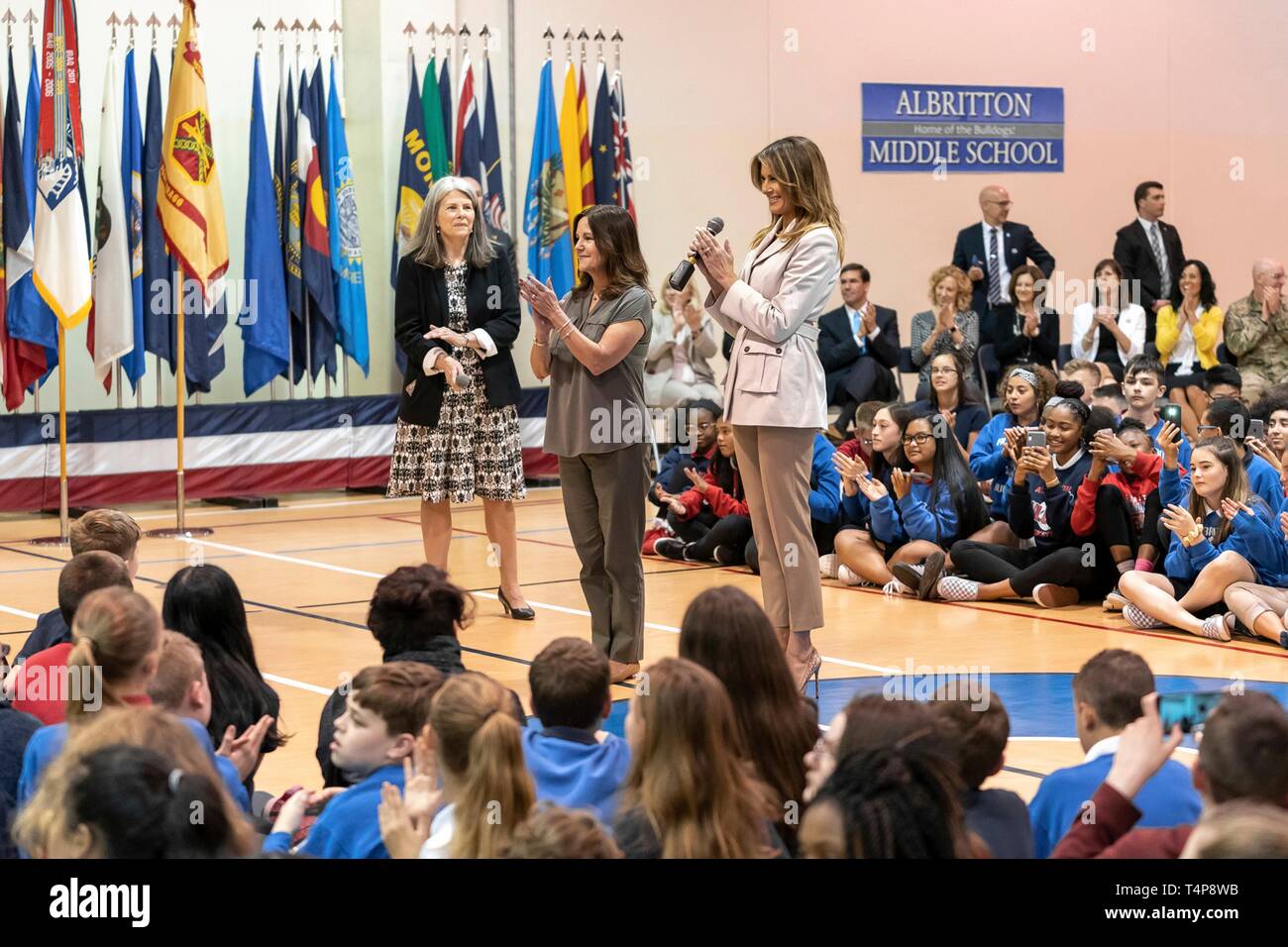 U.S First Lady Melania Trump, joined by Karen Pence, center, wife of Vice President Mike Pence, and school principal Dr. Laura Hussein, left, delivers remarks during an assembly at Albritton Middle School April 15, 2019 in Fort Bragg, North Carolina. The First Lady visited the school for military families then addressed soldiers at the base. Stock Photo