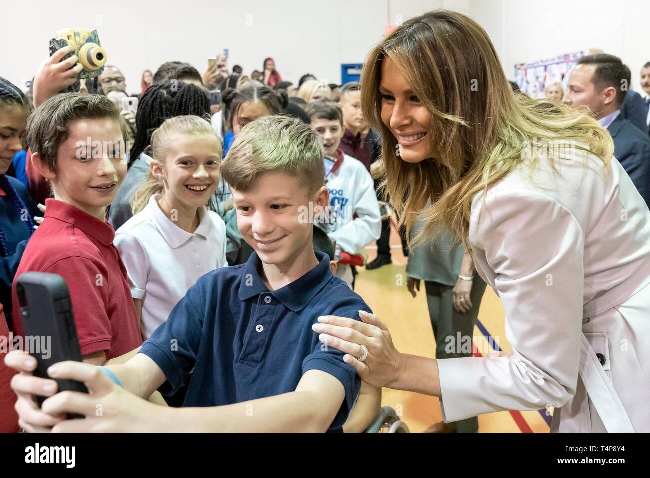 U.S First Lady Melania Trump, takes a selfie with students at Albritton