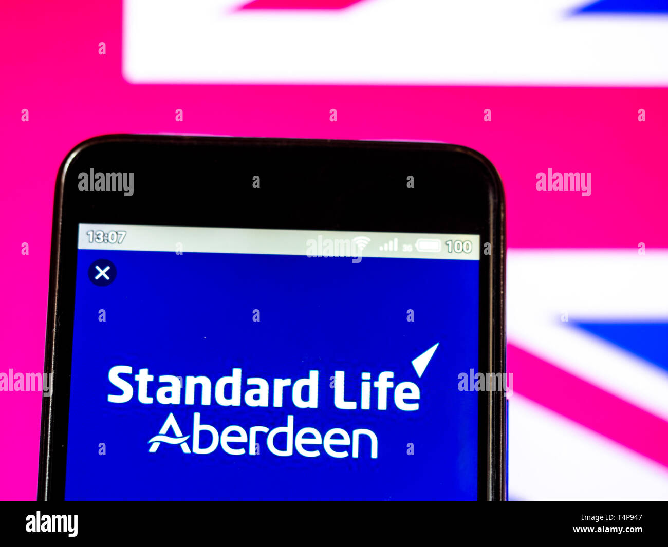 In this photo illustration a Standard Life Aberdeen plc logo seen displayed on a smart phone