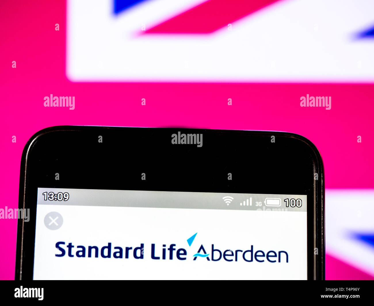 In this photo illustration a Standard Life Aberdeen plc logo seen ...