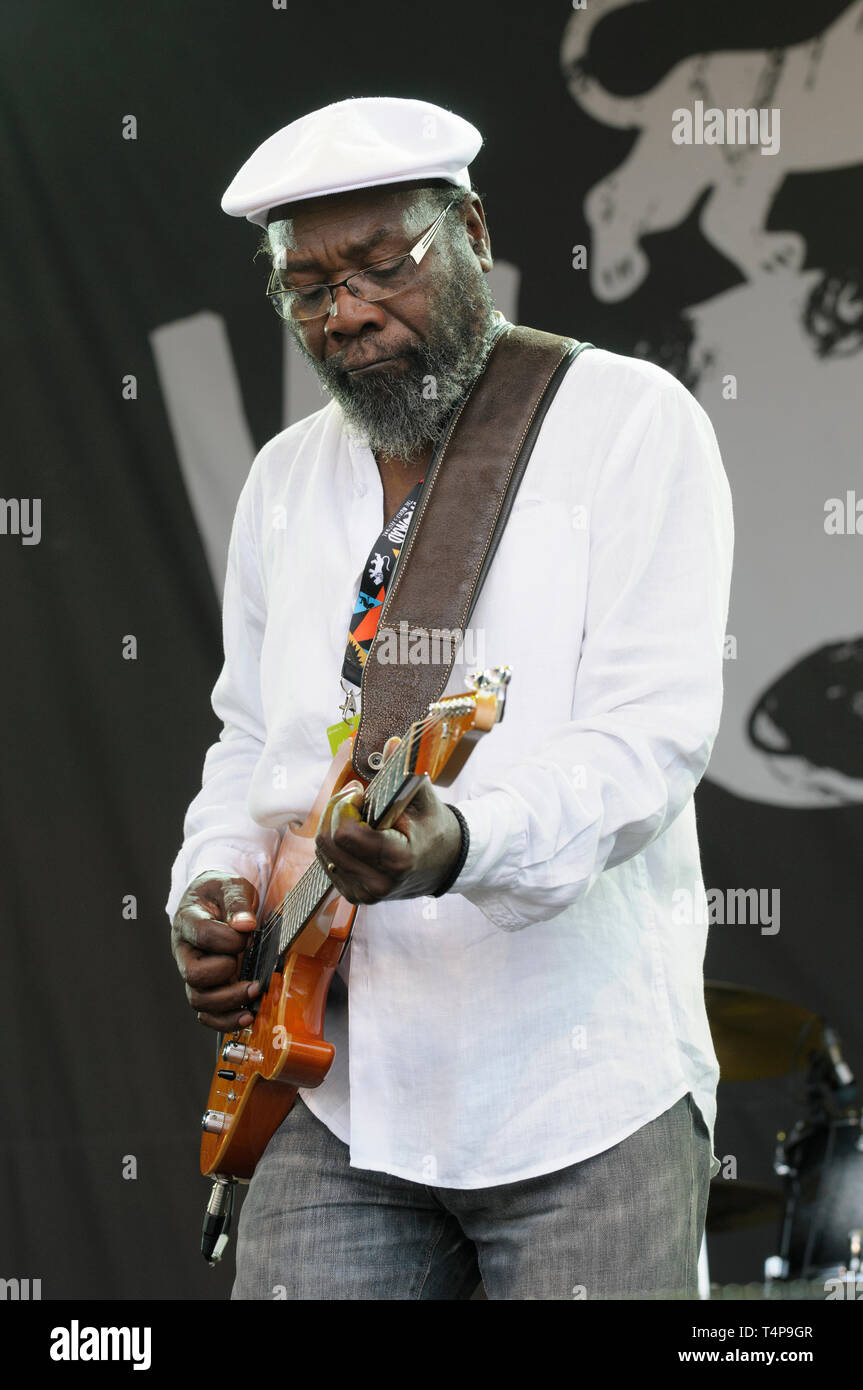 Jamaican reggae singer and musician, Clinton Fearon performing at the Womad Festival, Charlton Park, UK, July 25, 2014 Stock Photo