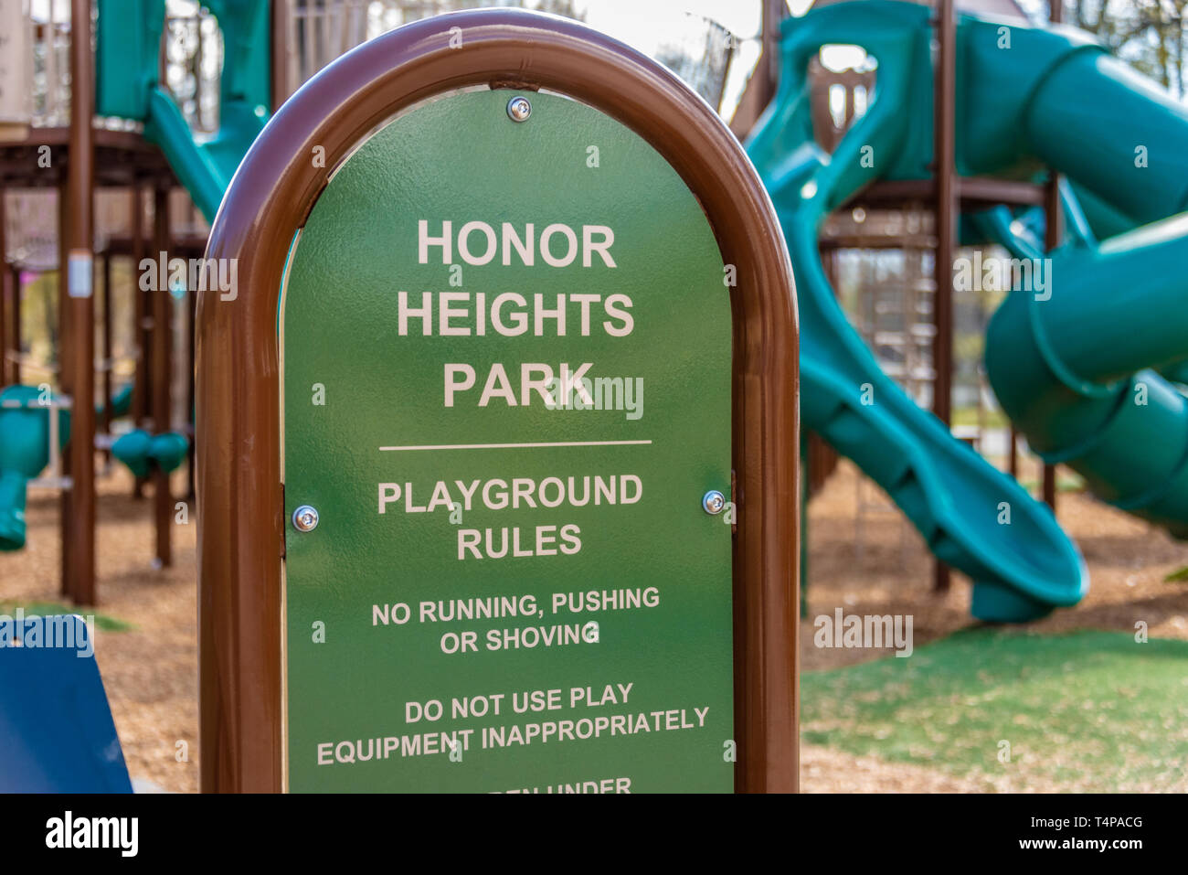 Playground rules sign at Honor Heights Park in Muskogee, Oklahoma. (USA) Stock Photo