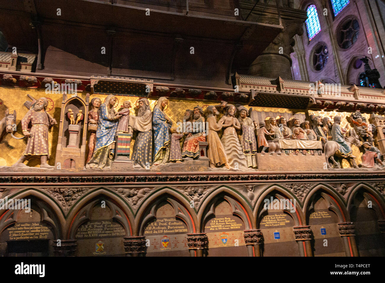 Colorful presentation in the temple bas-relief from Notre Dame de Paris. Cathedral of Our Lady of Chartres (Cathedrale Notre-Dame) Stock Photo