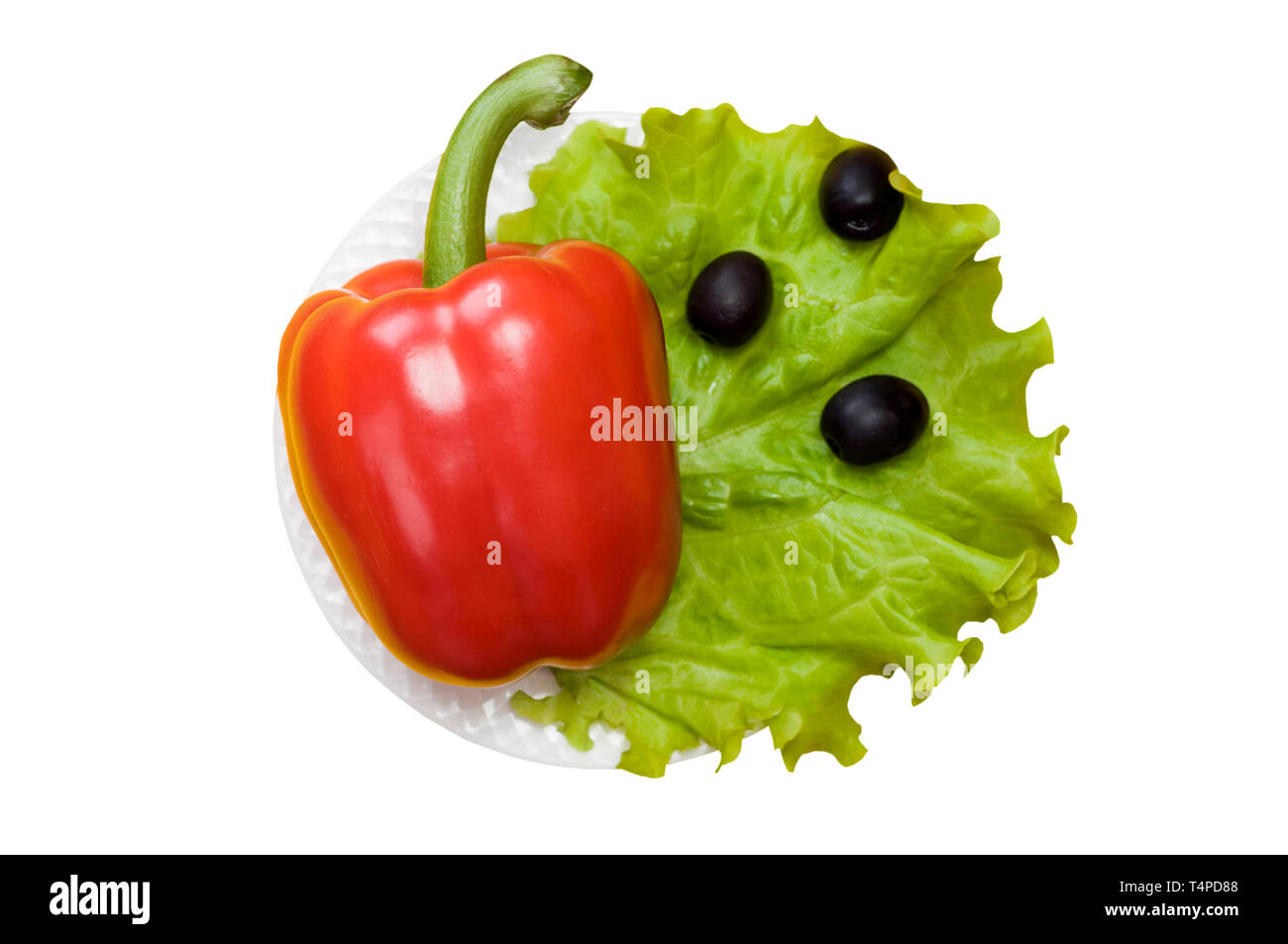 Bell pepper, olives, salad lettuce on white plate isolated on white