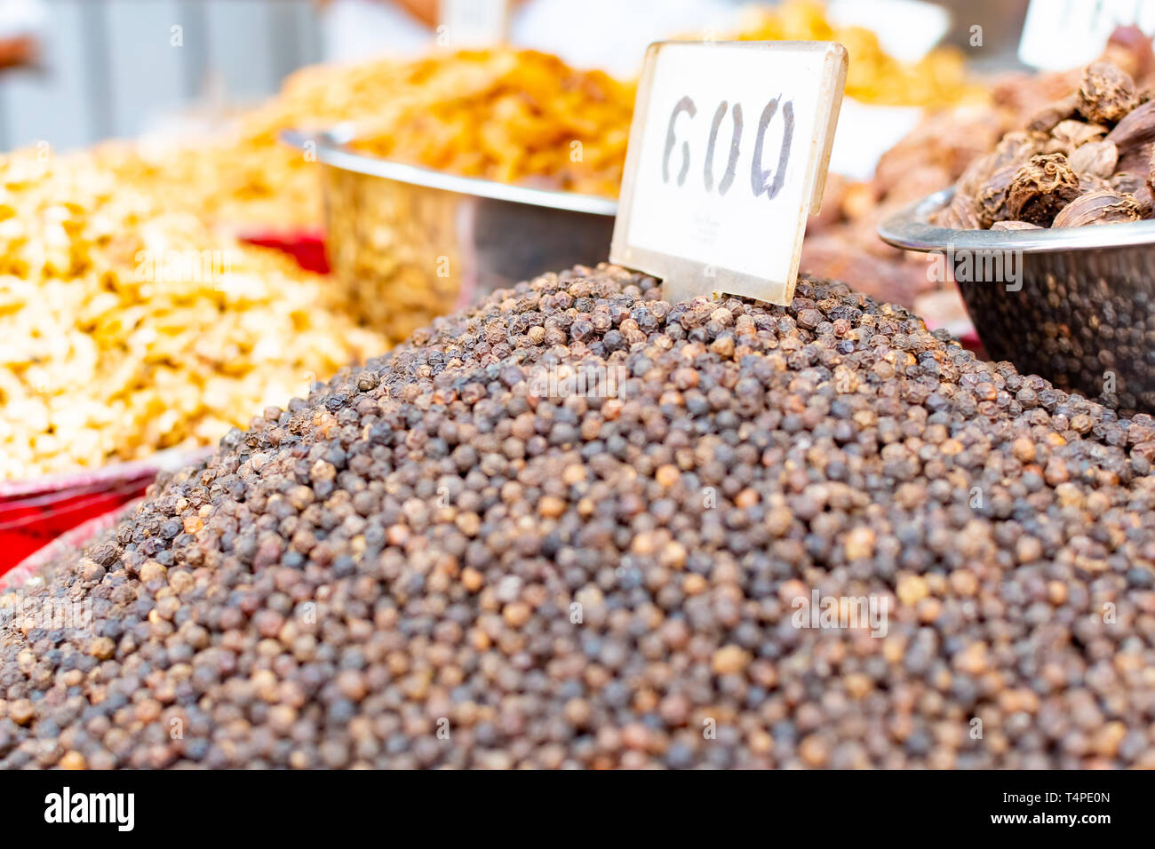 A pile of seed clove in traditional spicy market in New Delhi, India