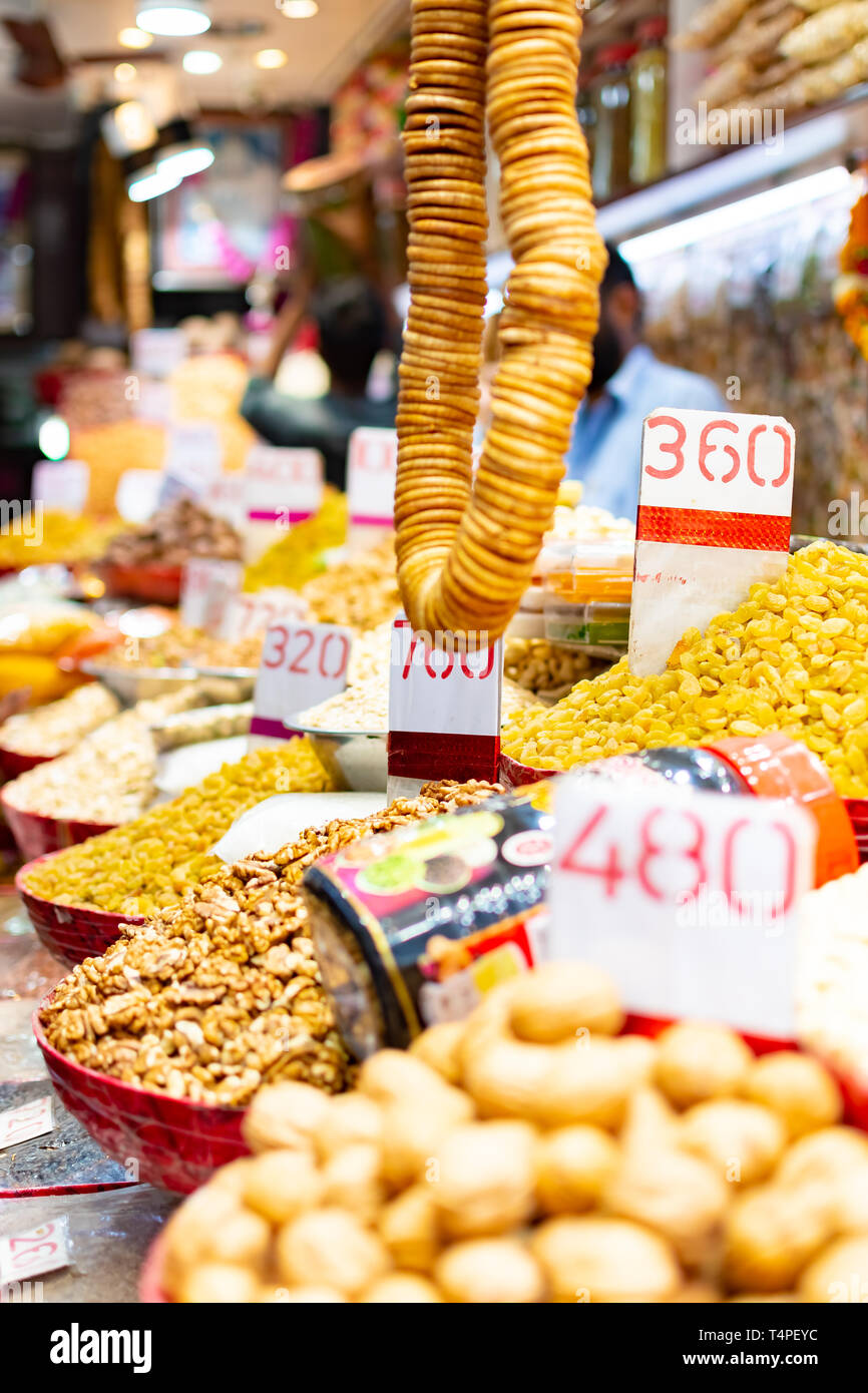 Spice market merchants and displays of a variety of fresh dried fruits