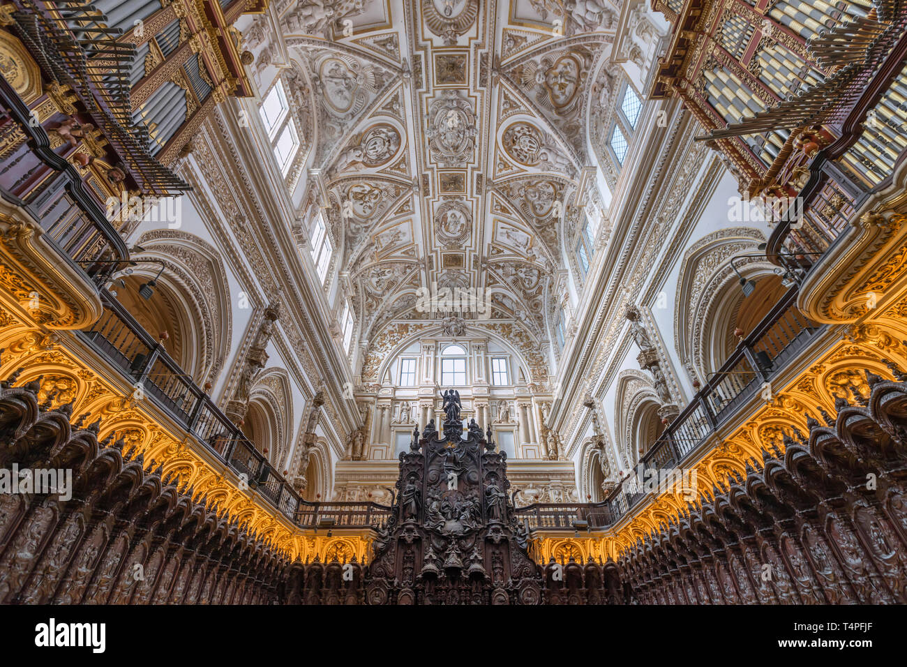 Mahogany choir stalls and lunette vault in the Santa Iglesia Cathedral (La Mezquita) in Cordoba. Stock Photo