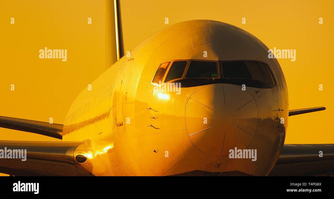 Detail view of airliner in warm sunlight. Stock Photo