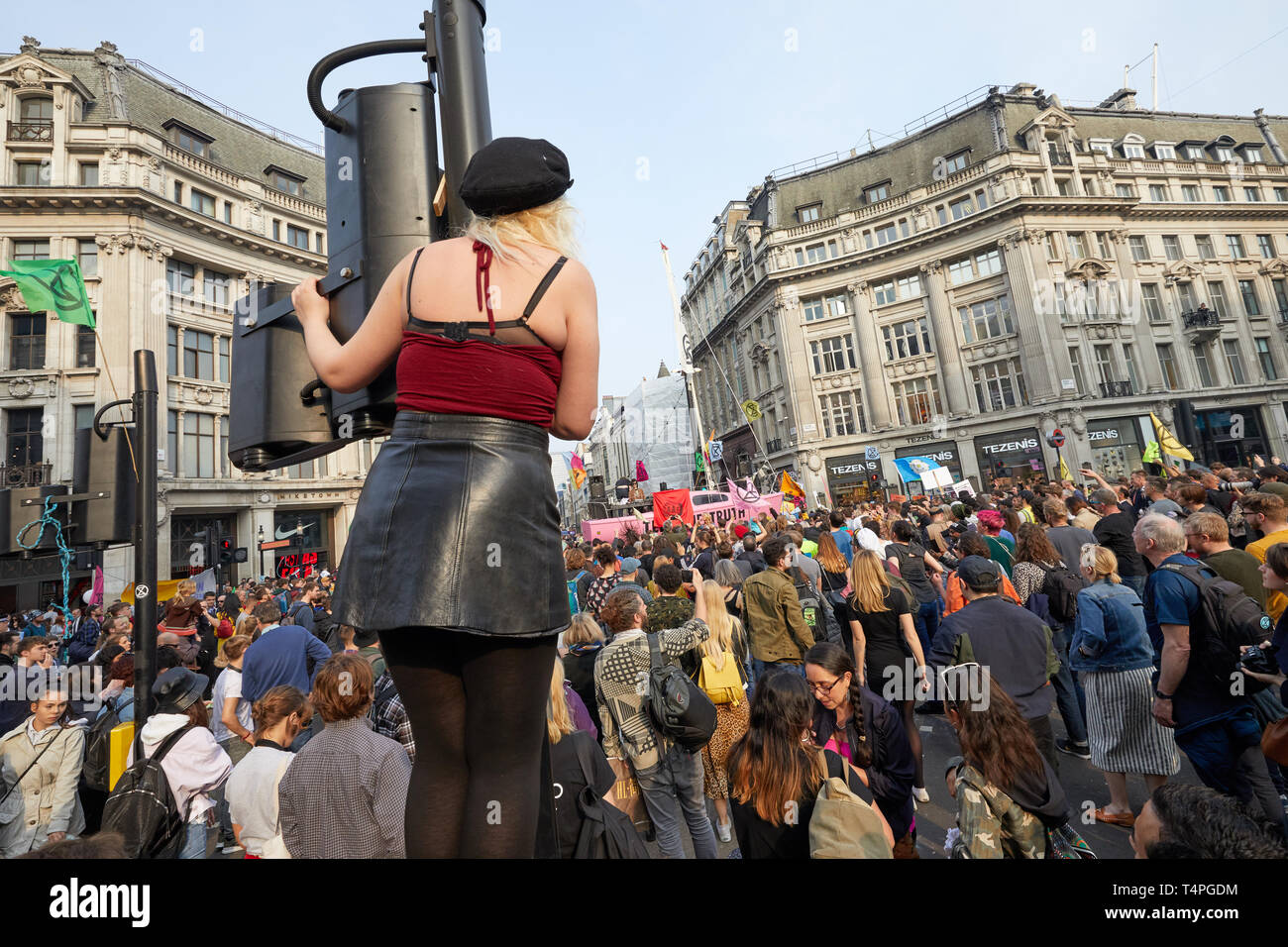 London, UK. - April 17, 2019: Supporters of climate change group Extinction Rebellion surround a boat blocking Oxford Circus. Stock Photo