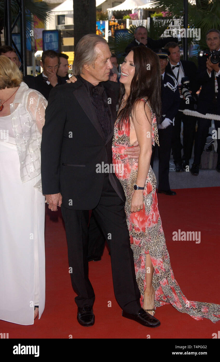 CANNES, FRANCE. May 21, 2004: DAVID CARRADINE & wife at the gala screening at the Cannes Film Festival of The Life & Death of Peter Sellers. Stock Photo