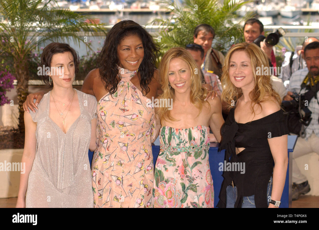 CANNES, FRANCE. May 22, 2004: ALANIS MORISSETTE (left), NATALIE COLE, SHERYL CROW & LARA FABIAN at photocall for their new movie De-Lovely which is the closing film of the 57th Festival de Cannes. Stock Photo