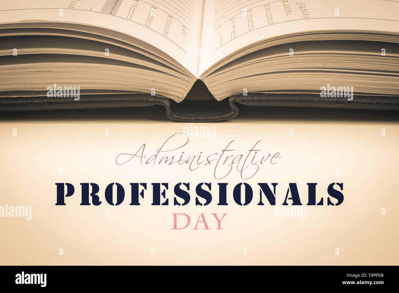 Administrative Professionals Day text card with open agenda. Vintage style. Stock Photo