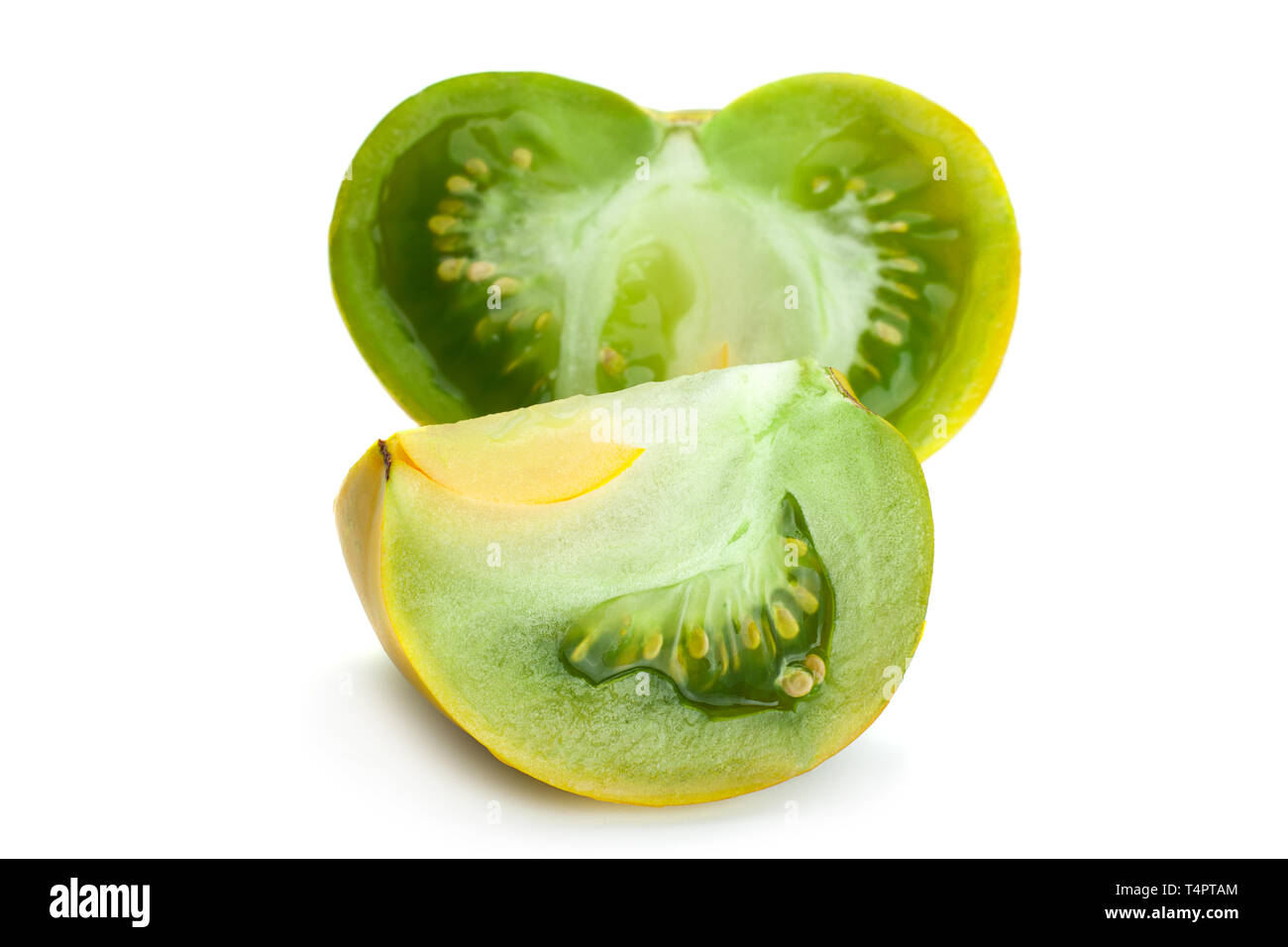 Green ripe tomatoes "Magic Glow" isolated on white Stock Photo - Alamy