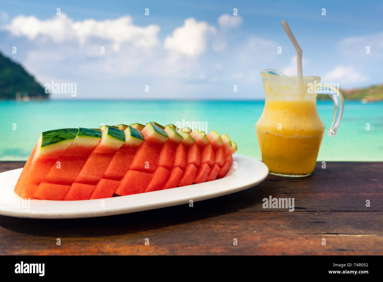 Refreshing tropical pineapple fruit juice smoothie drink and watermelon ...
