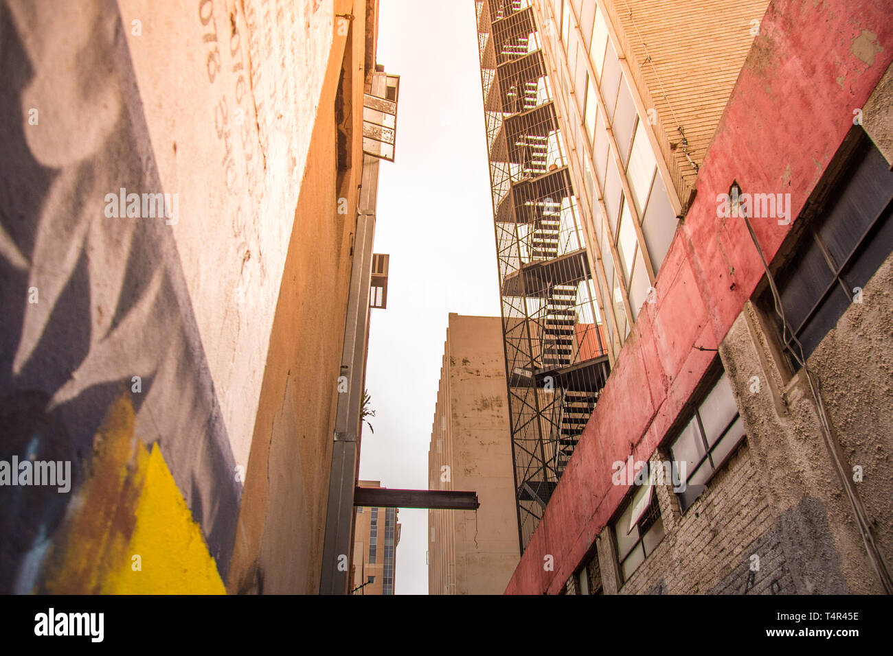 Johannesburg / South Africa - November 19 2016: an alleyway between tall buildings Stock Photo