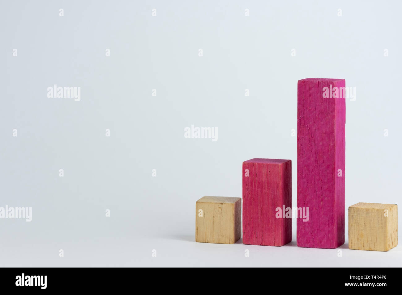 Colored Block Graph Close up image of colored wooden blocks as a graph Stock Photo - Alamy