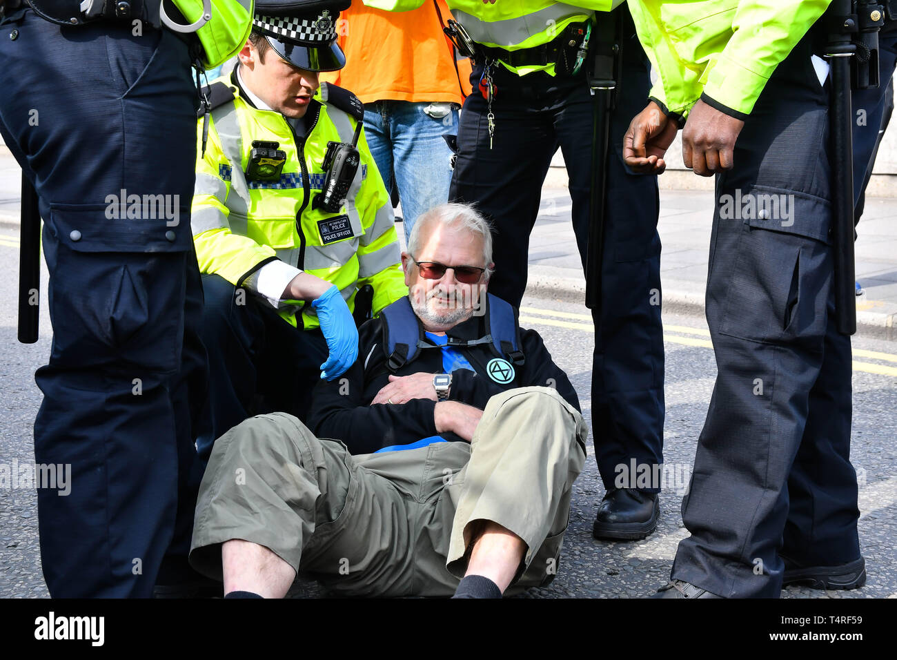 Waterloo Bridge, London, UK. 18th Apr 2019. Activists arrested at Waterloo Bridge in demand the UK Govt to act of Climate Change by 2025 on 18 April 2019, London, UK. Credit: Picture Capital/Alamy Live News Stock Photo