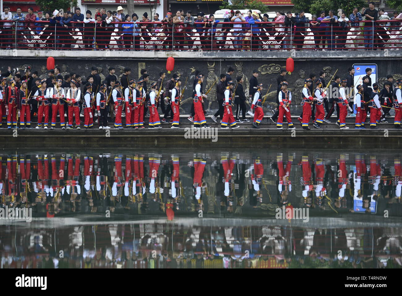 Taijiang, China's Guizhou Province. 19th Apr, 2019. People of Miao ethnic group attend a singing event to celebrate the Miao Sisters Festival in Taijiang County, Qiandongnan Miao and Dong Autonomous Prefecture, southwest China's Guizhou Province, April 19, 2019. Miao Sisters Festival is enlisted in the first batch of national intangible cultural heritages in 2006. Credit: Ouyang Guanglin/Xinhua/Alamy Live News Stock Photo