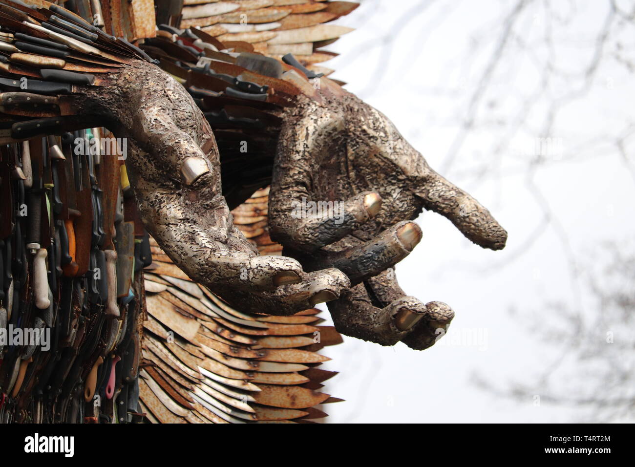 Statue made out of knives to show danger and sadness .outside Coventry