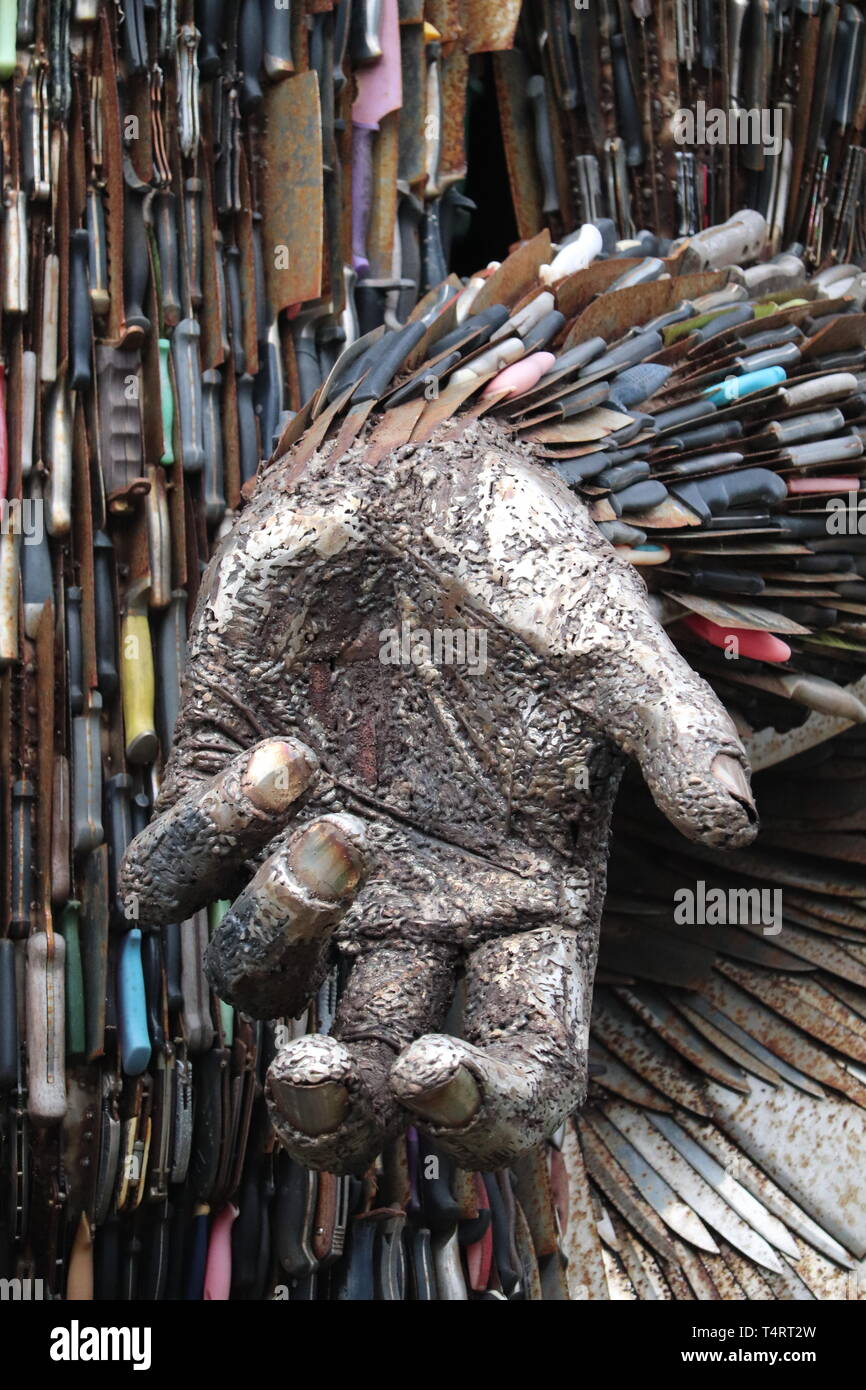 Statue made out of knives to show danger and sadness .outside Coventry