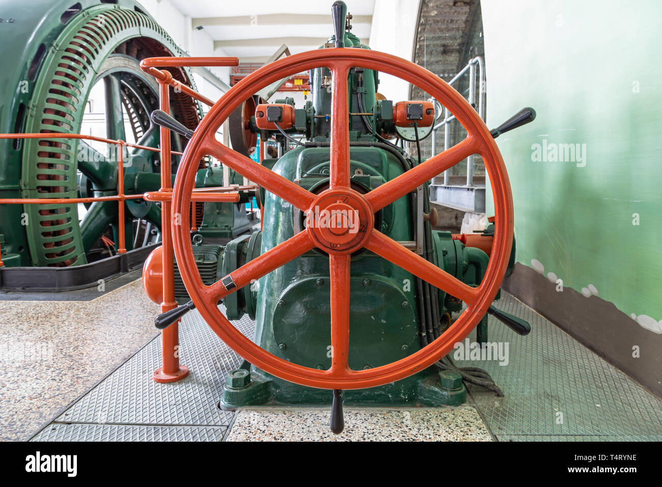 Control wheel of the turbine governor in an old power plant in Germany Stock Photo