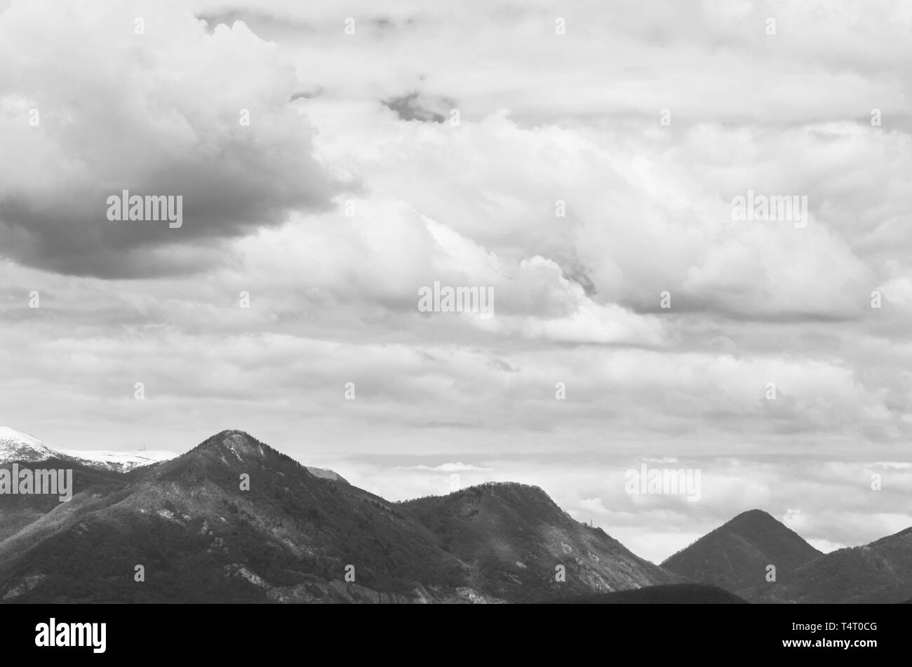clouds formations over mountains and foothills top - spring weather Stock Photo