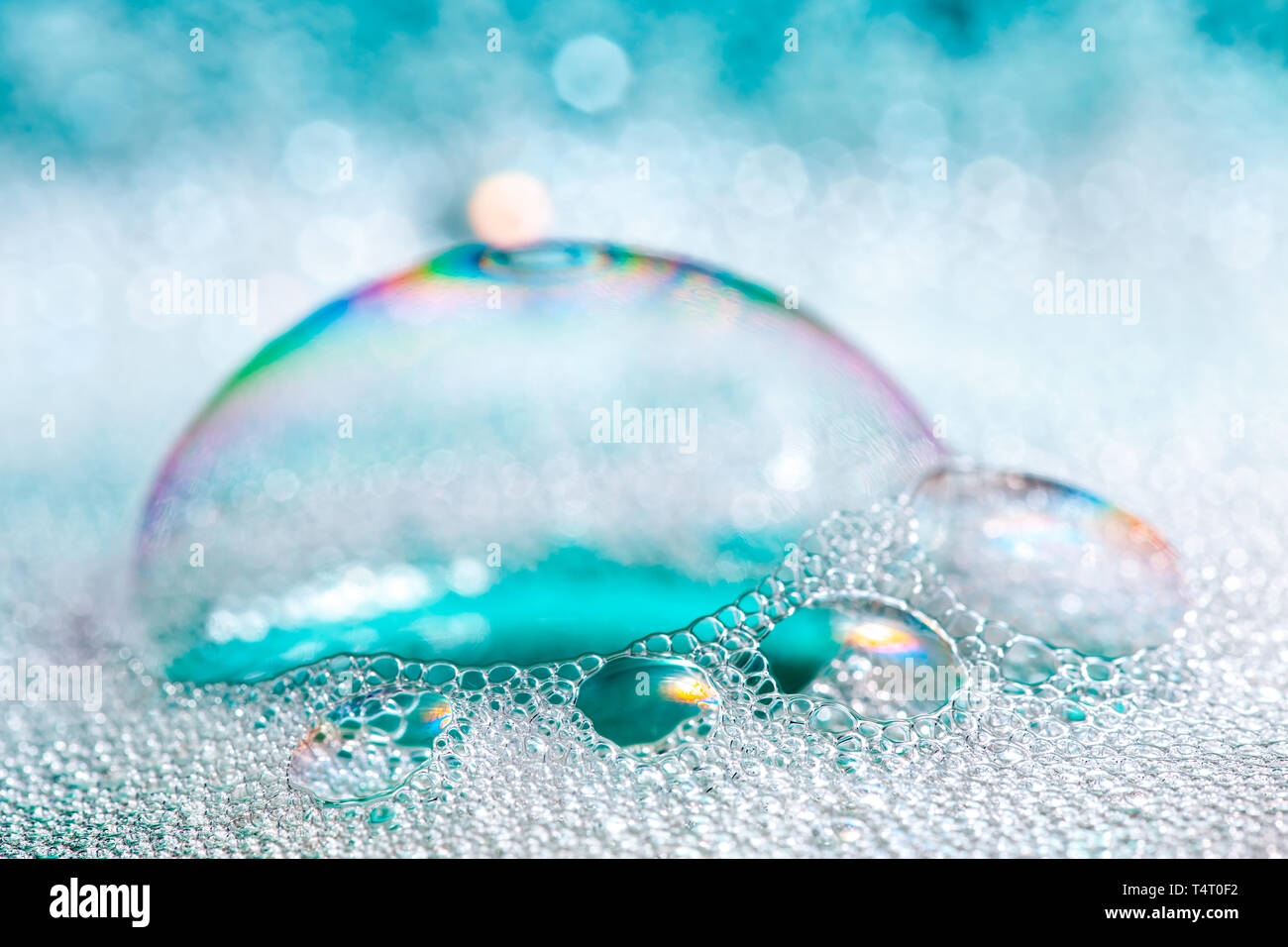 Clean blue soap bubbles and suds Stock Photo