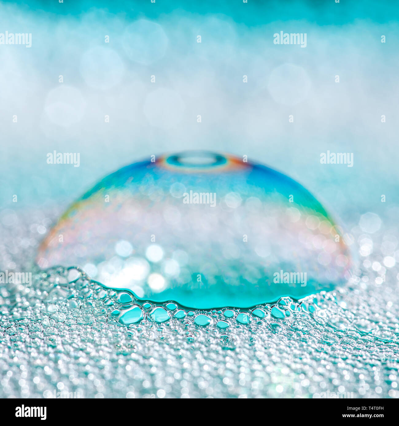 Clean blue soap bubbles and suds Stock Photo
