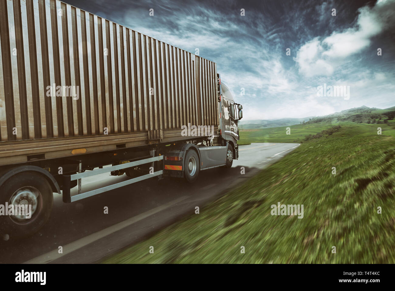 Moving truck in a natural landscape background Stock Photo