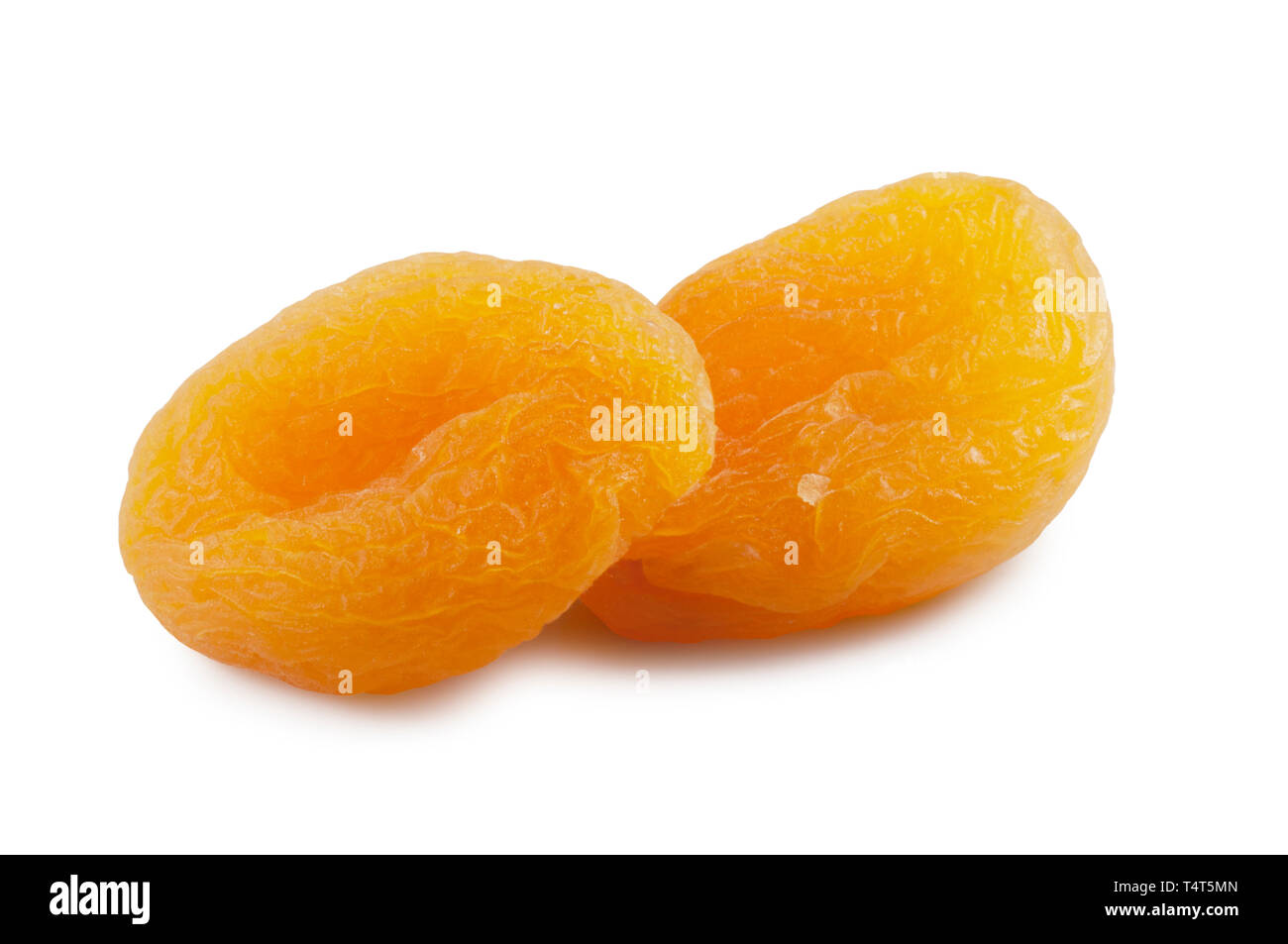 Studio shot of two apricots isolated on a white background - John Gollop Stock Photo
