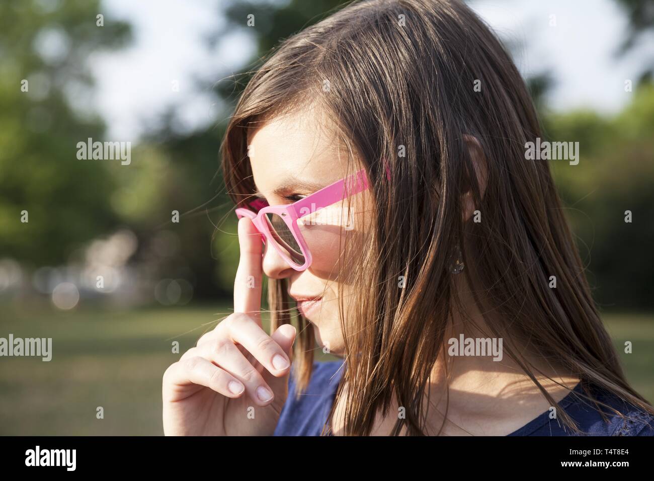 Young woman wearing sunglasses, Germany Stock Photo