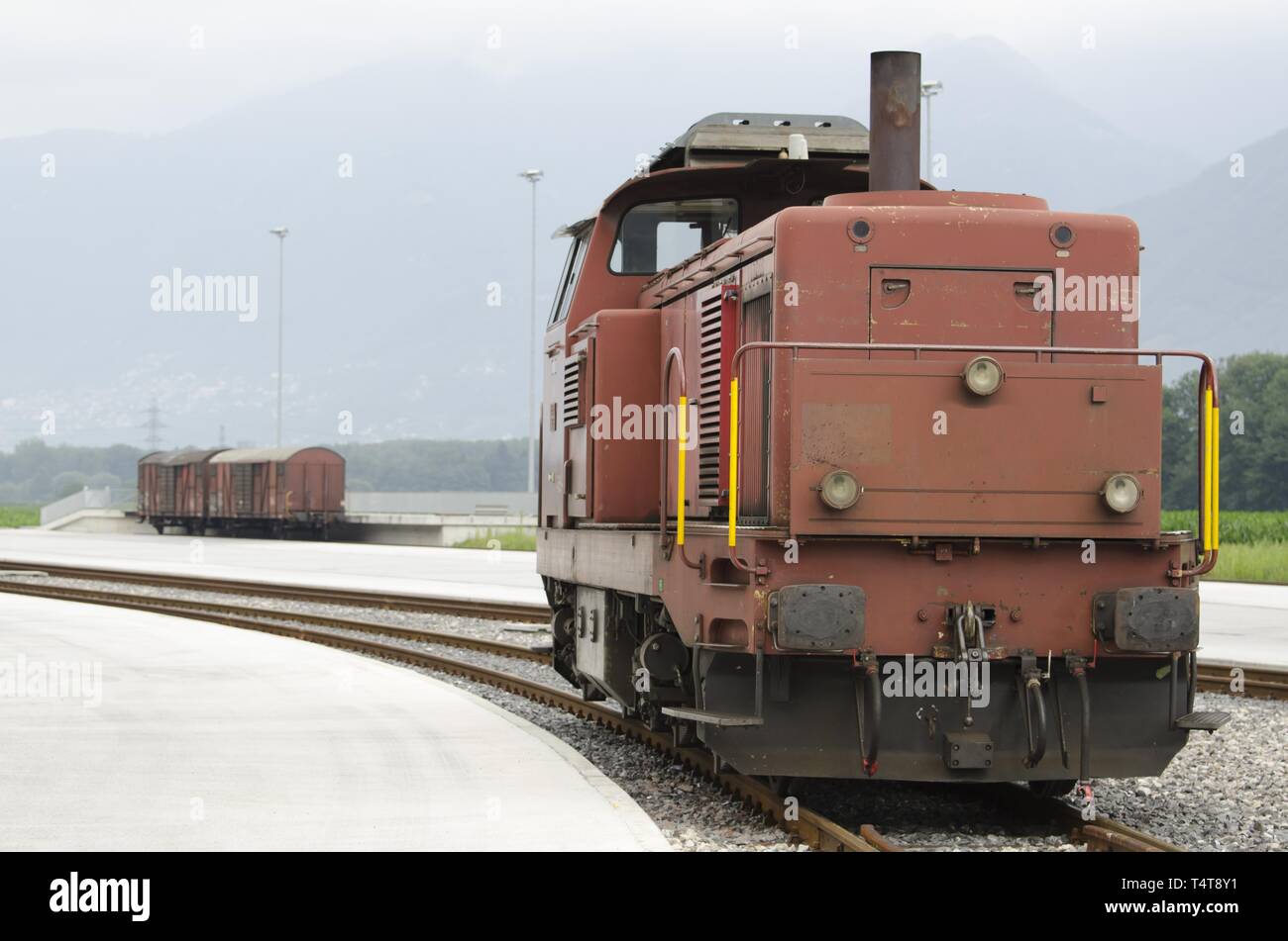 Train and wagon on the station in Switzerland Stock Photo