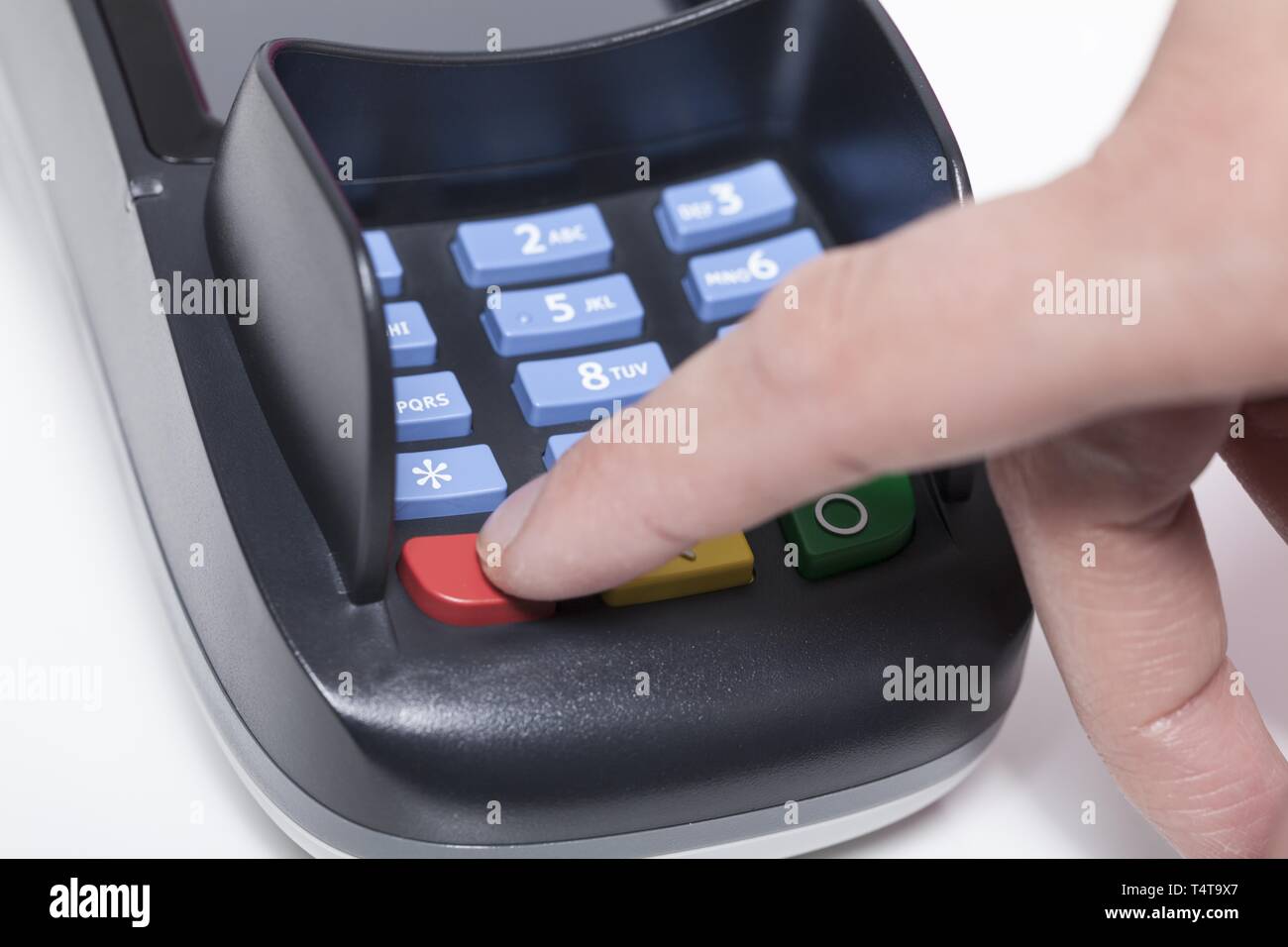 Finger, cancel transaction on the card reader Stock Photo