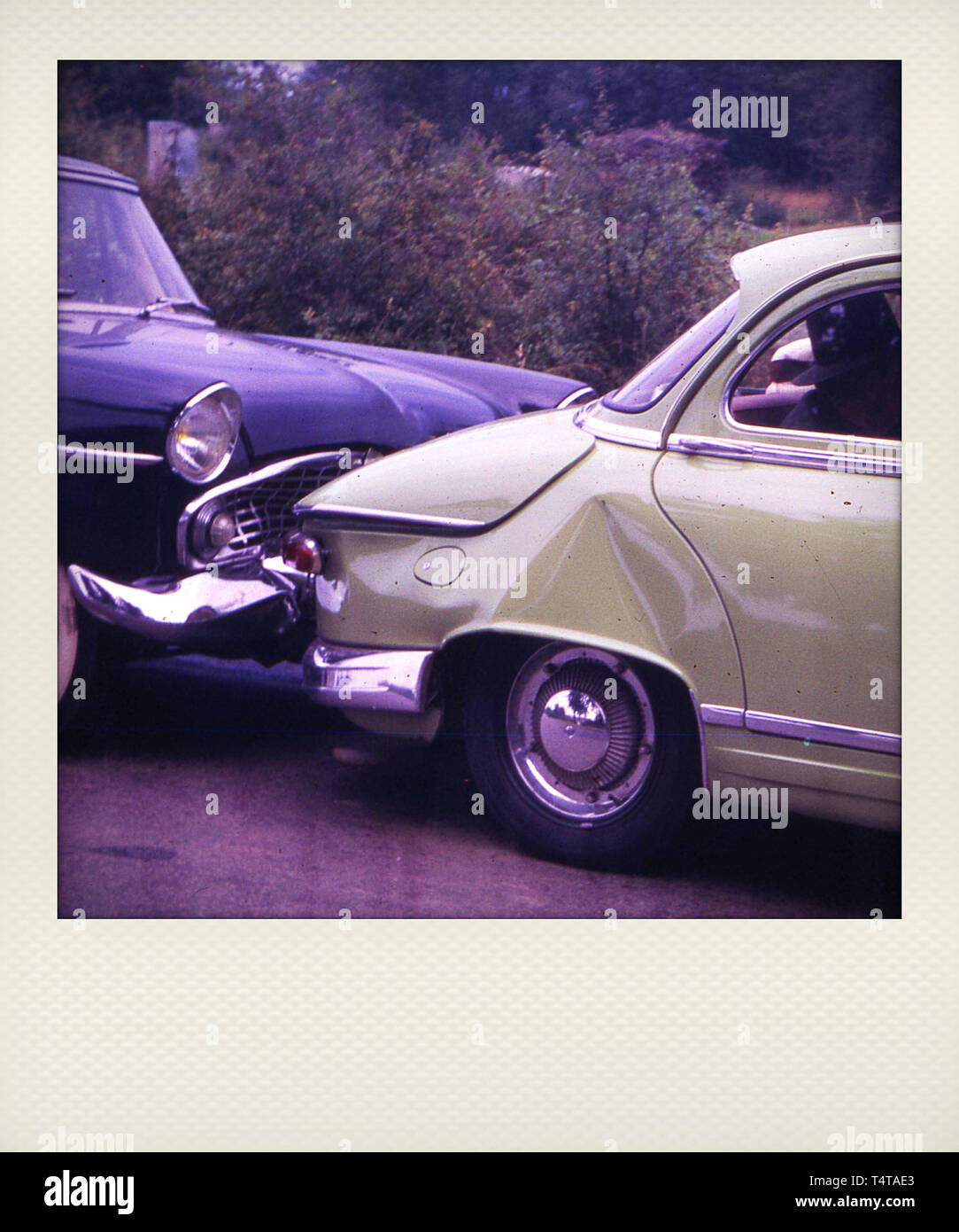 Bumpers crashed between two old cars Stock Photo