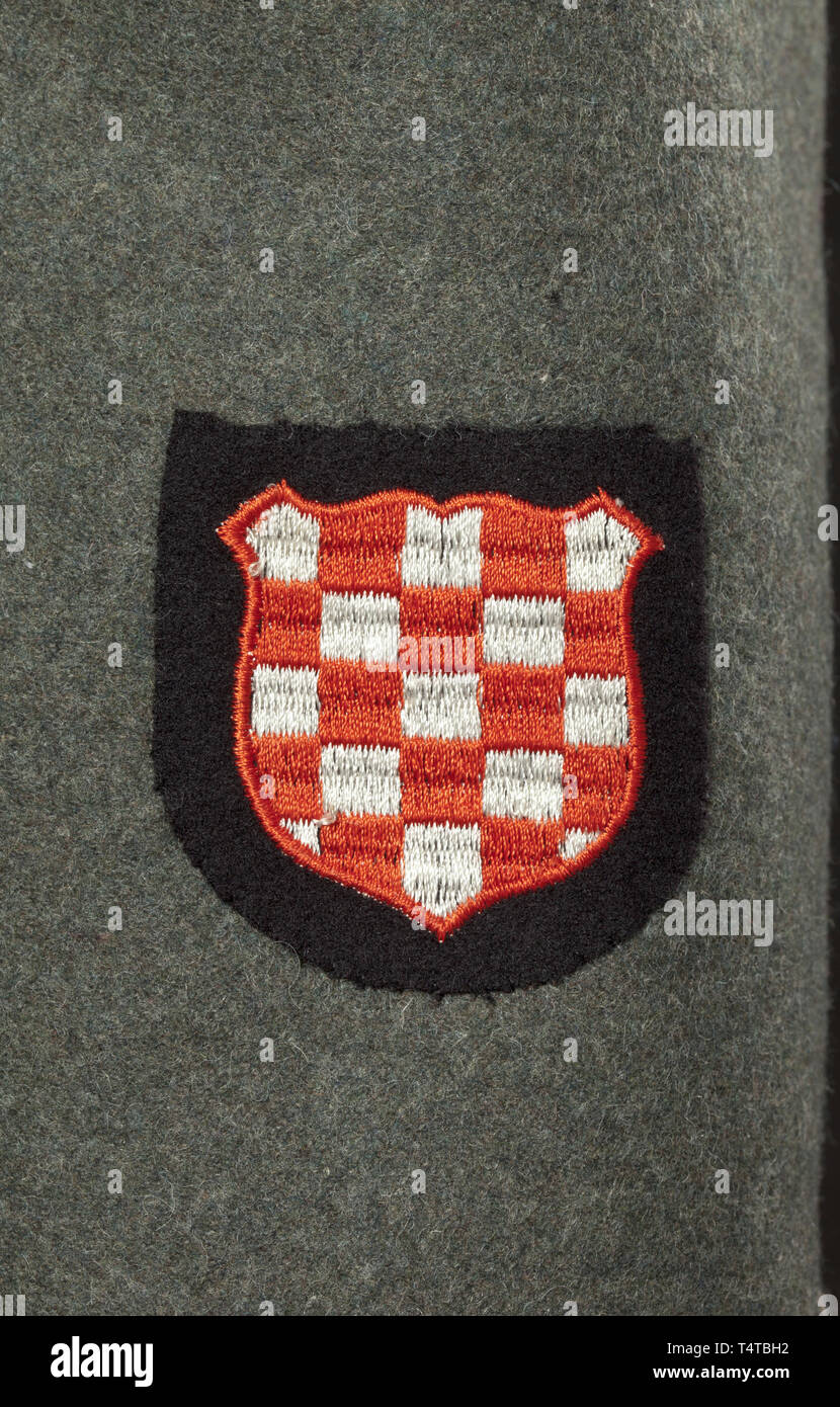 A Field Tunic M 43 For A Member Of 13th Waffen Mountain Division Of The Ss Handschar 1st Croatian Depot Piece From 1943 Ss Cut With Five Button And Two Belt Holes