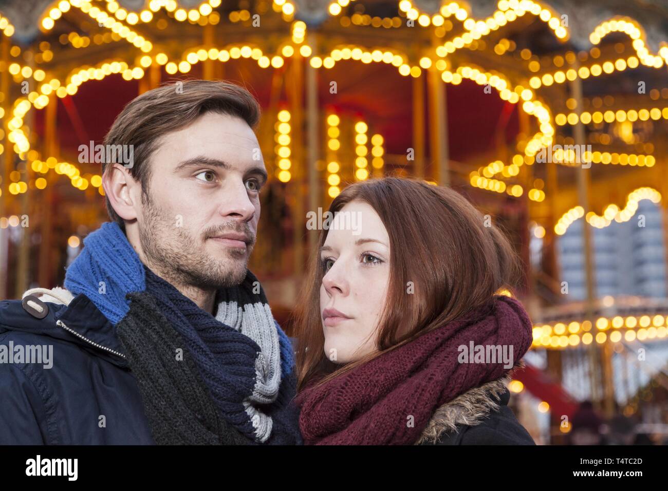 A couple doesn't look in each others eyes, Christmas Market, Germany, Europe Stock Photo